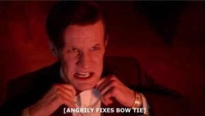 man fixing bowtie with funny subtitle